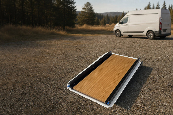 A full extension slide tray with a finished ply deck beside a van