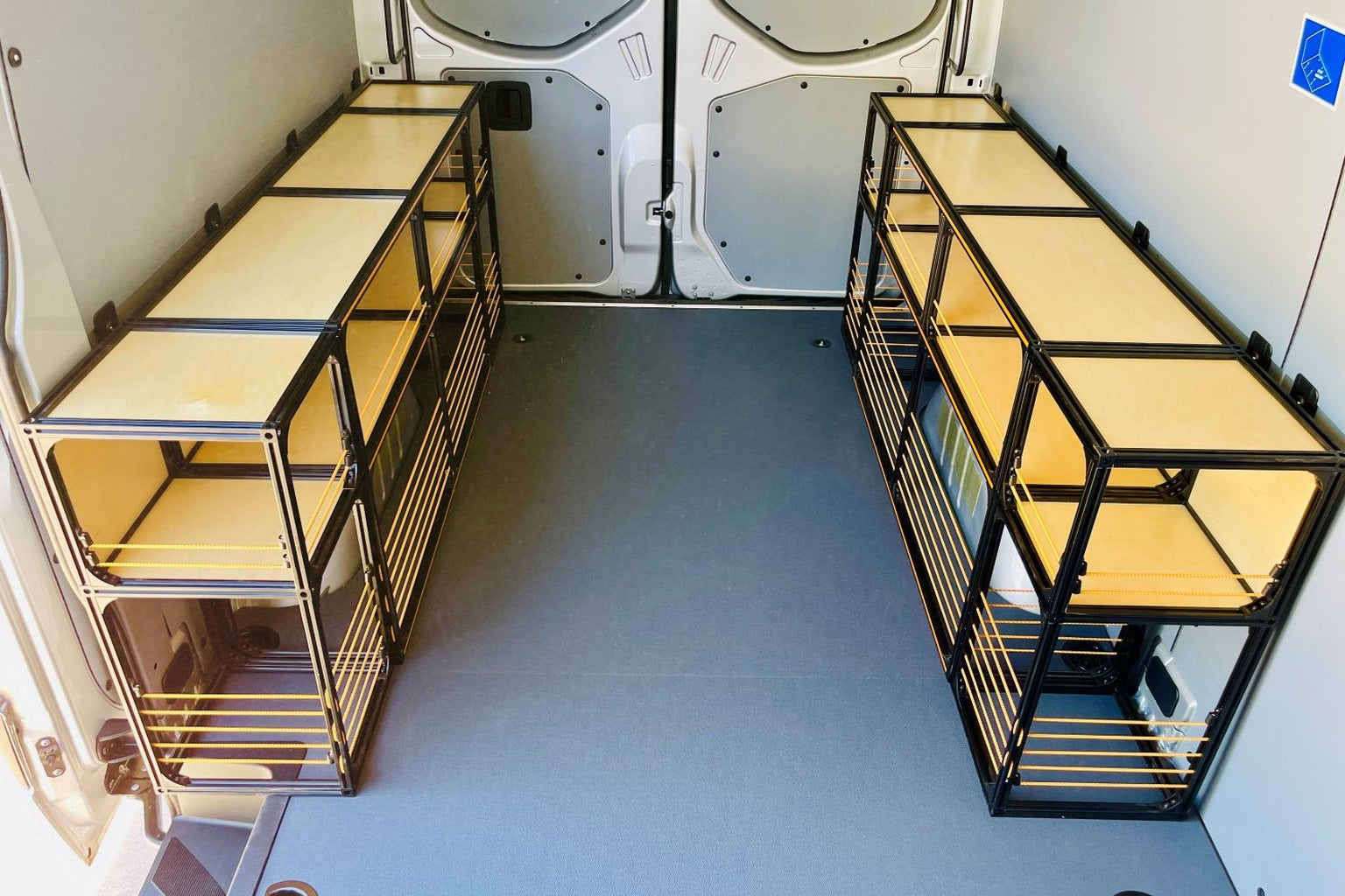 A powder coated square tube shelving unit with finished ply shelves