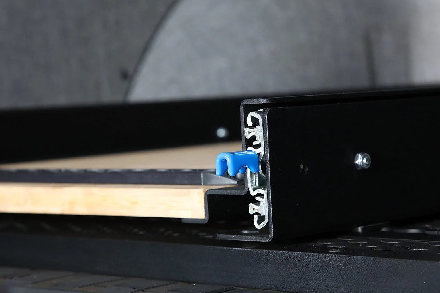 Slide tray rail and bamboo deck inside a van