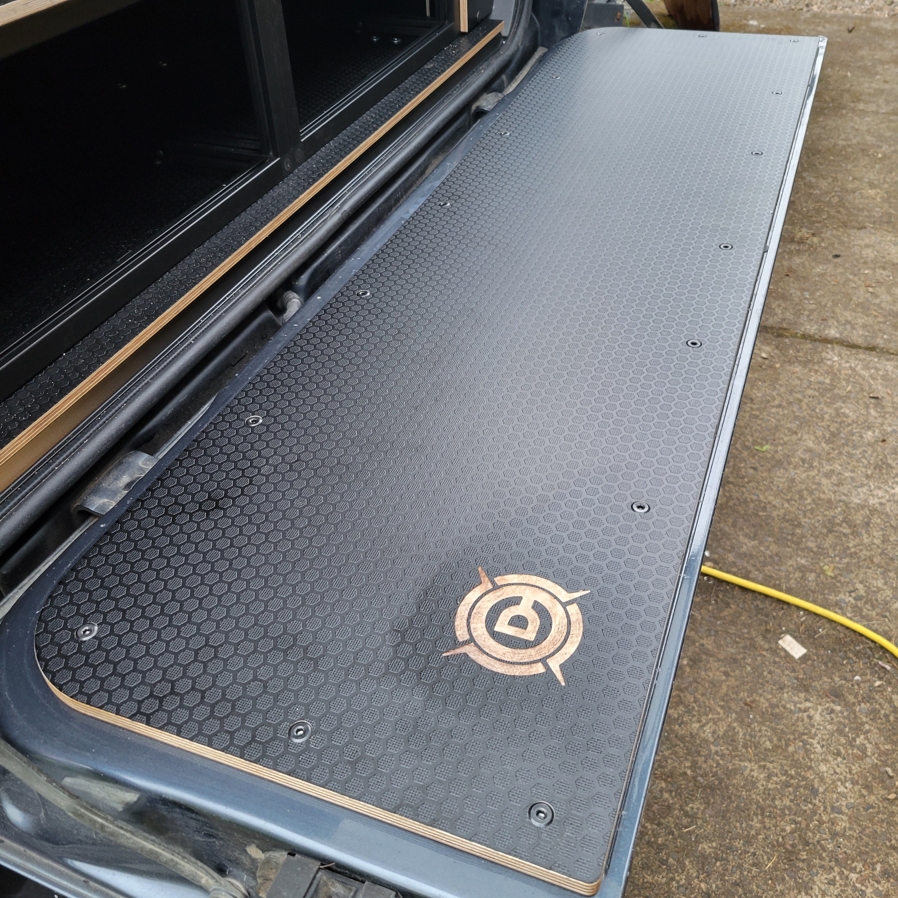 Overland Custom Design Land Cruiser tailgate work panel fitted to the open tailgate of a Toyota