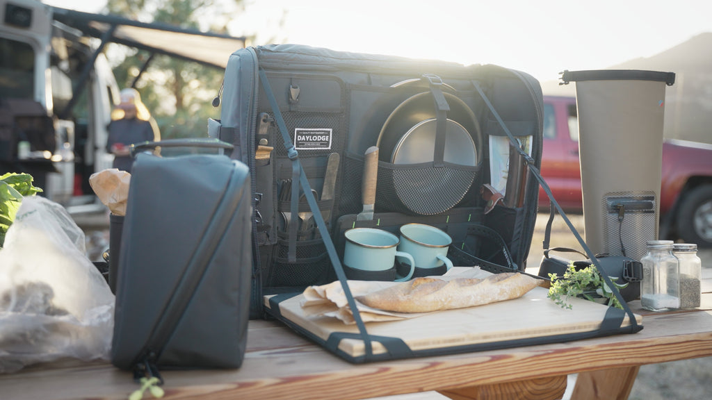 Wider view of the DAYLODGE Workspace Camp Collection Kitchen Set, part of a vehicle based camp and travel setup
