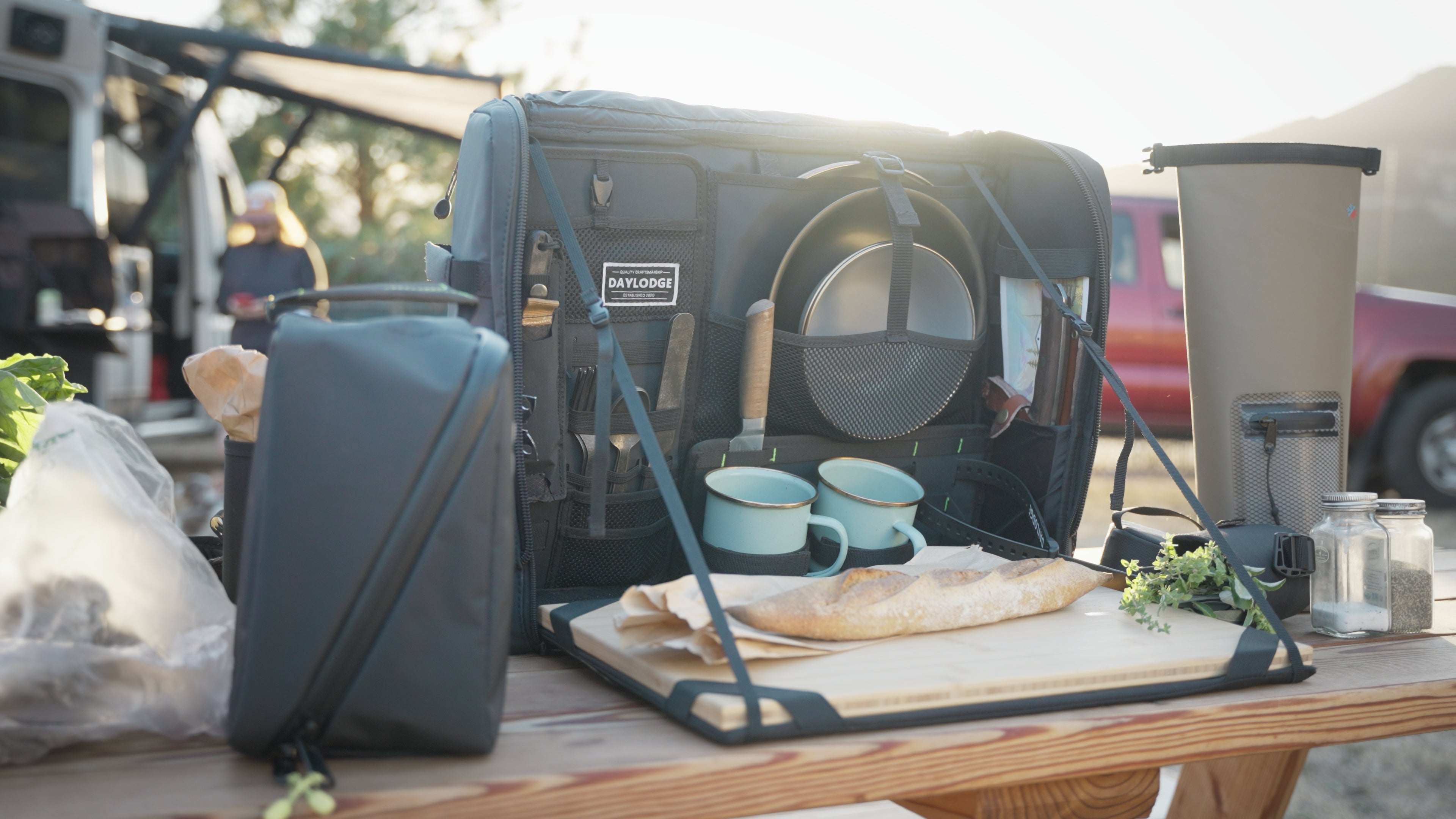 DAYLODGE Workspace mobile camp kitchen set up and open, with utensils and gear ready for cooking