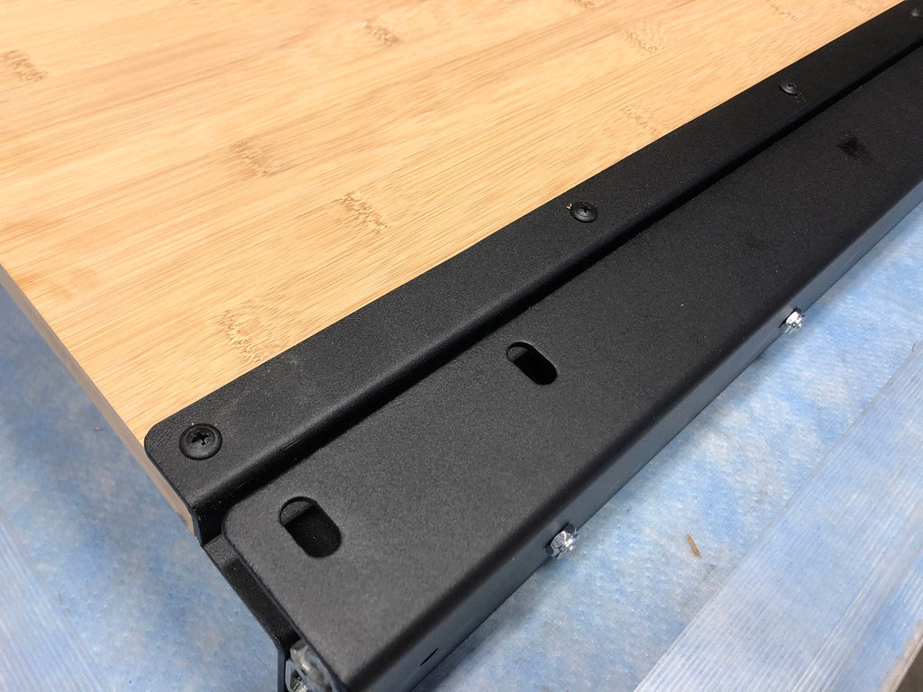 In use view of the RB Components 60 Inch DIY Slide Tray Kit, a full extension slide tray with a timber deck for van cargo