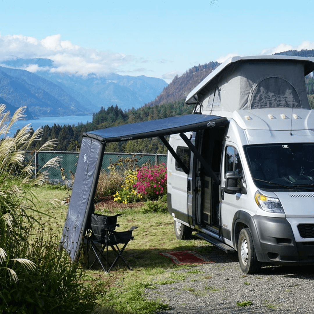 Lifestyle view of the DAYLODGE AirHaven 40 Annex Wall Kit, part of a vehicle based camp and travel setup