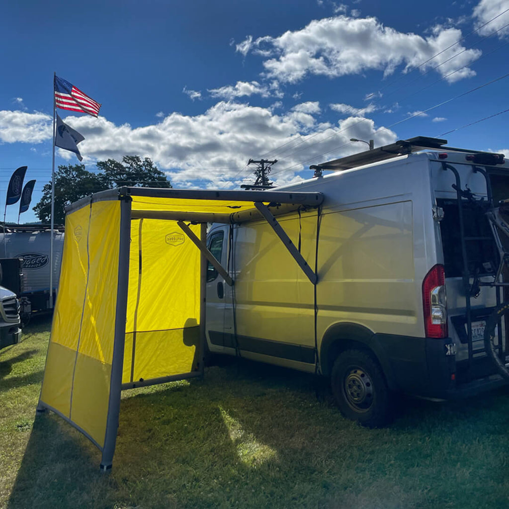 Supporting view of the DAYLODGE AirHaven 40 Annex Wall Kit, part of a vehicle based camp and travel setup