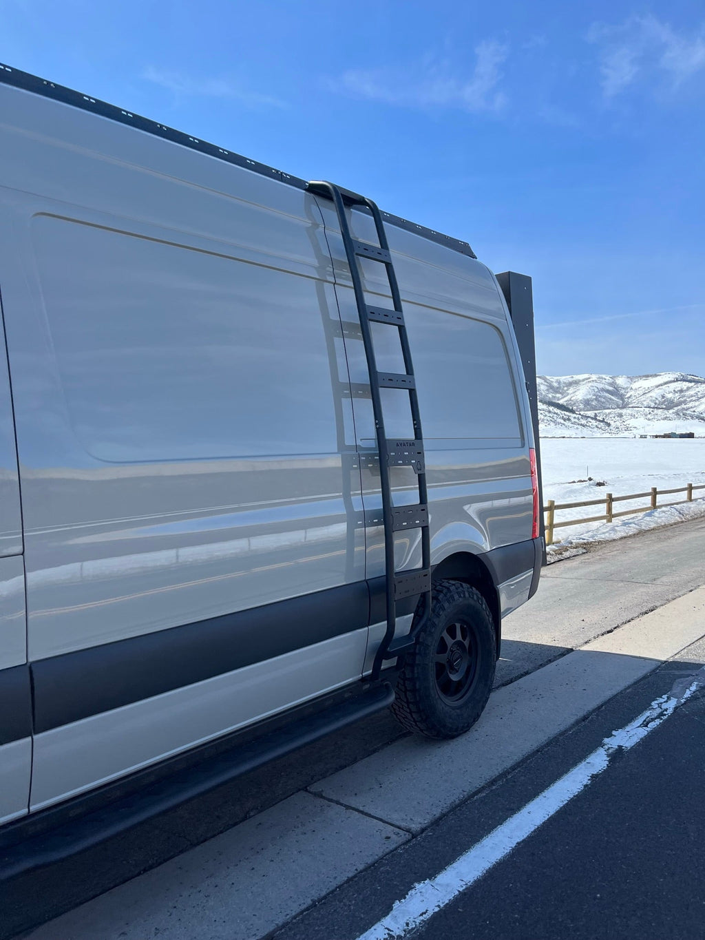 Another angle on the Avatar Offroad Ultra Rack Low Profile Sprinter Roof Rack, fitted to an overland van build
