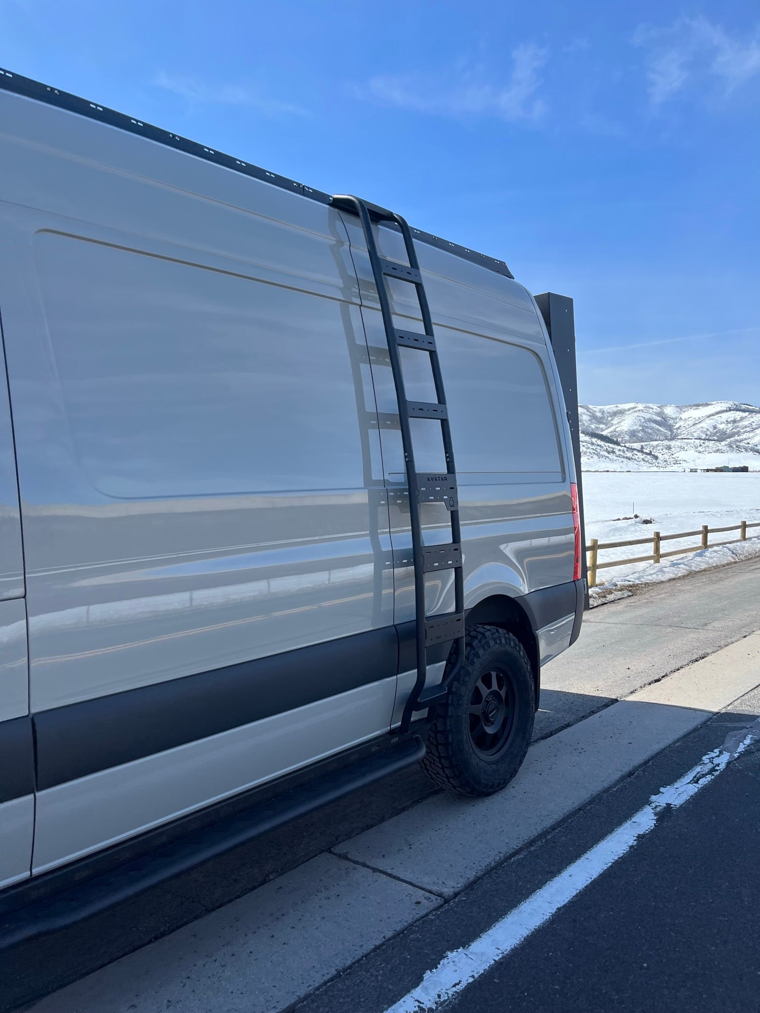 Another angle on the Avatar Offroad Ultra Rack Low Profile Sprinter Roof Rack, fitted to an overland van build