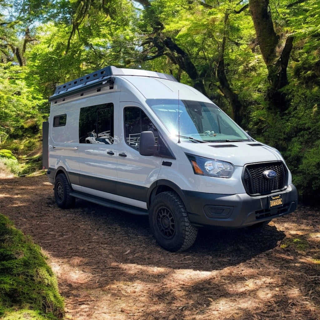 Side view of the Avatar Offroad Rockbody Side Steps for Ford Transit, fitted to an overland van build
