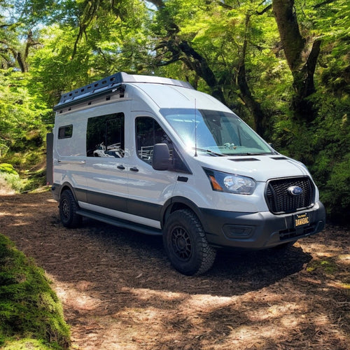 Side view of the Avatar Offroad Rockbody Side Steps for Ford Transit, fitted to an overland van build