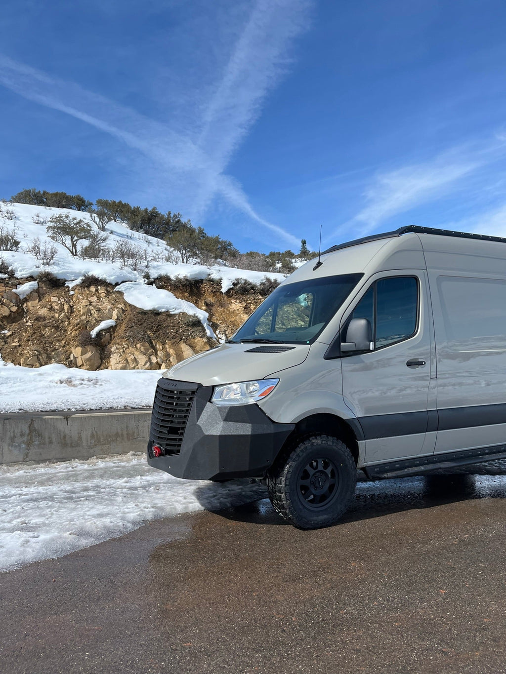 Wider view of the Avatar Offroad Ultra Rack Low Profile Sprinter Roof Rack, fitted to an overland van build