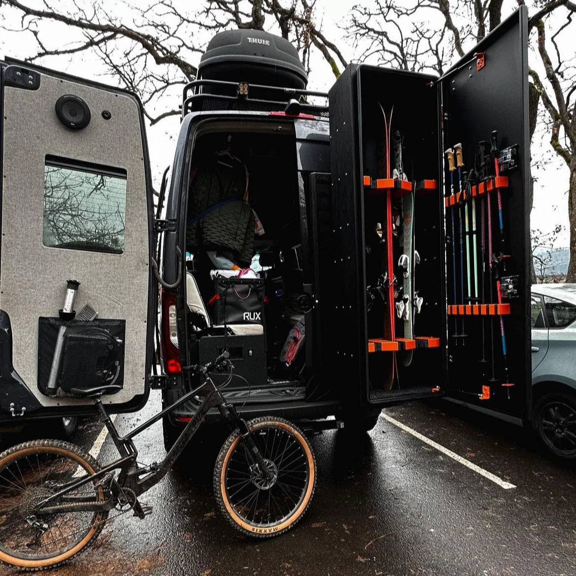 Another angle on the Avatar Offroad Ski 6 Rear Door Ski and Snowboard Box, fitted to an overland van build
