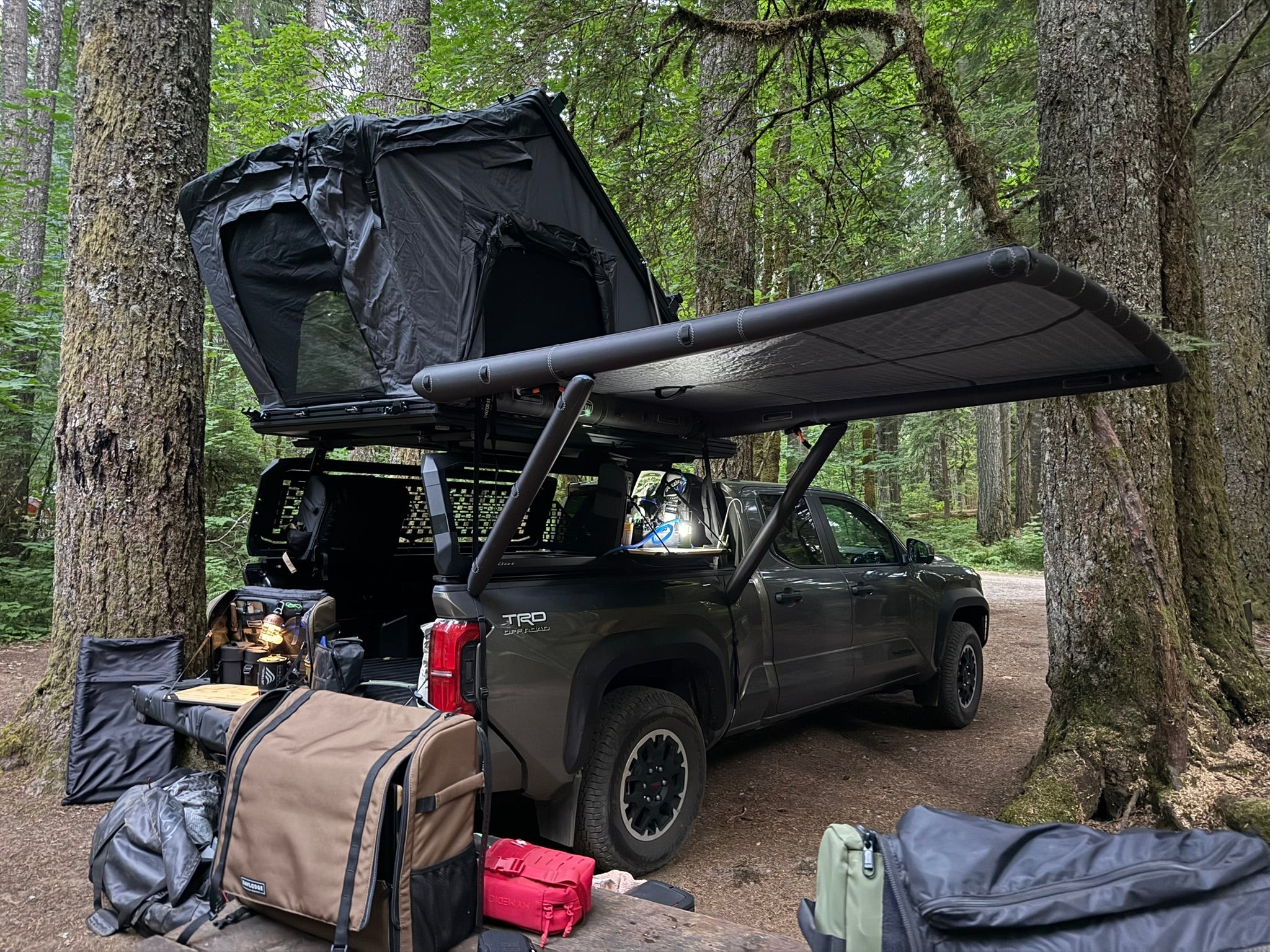 Second angle on the DAYLODGE AirHaven 40 Annex Wall Kit, part of a vehicle based camp and travel setup