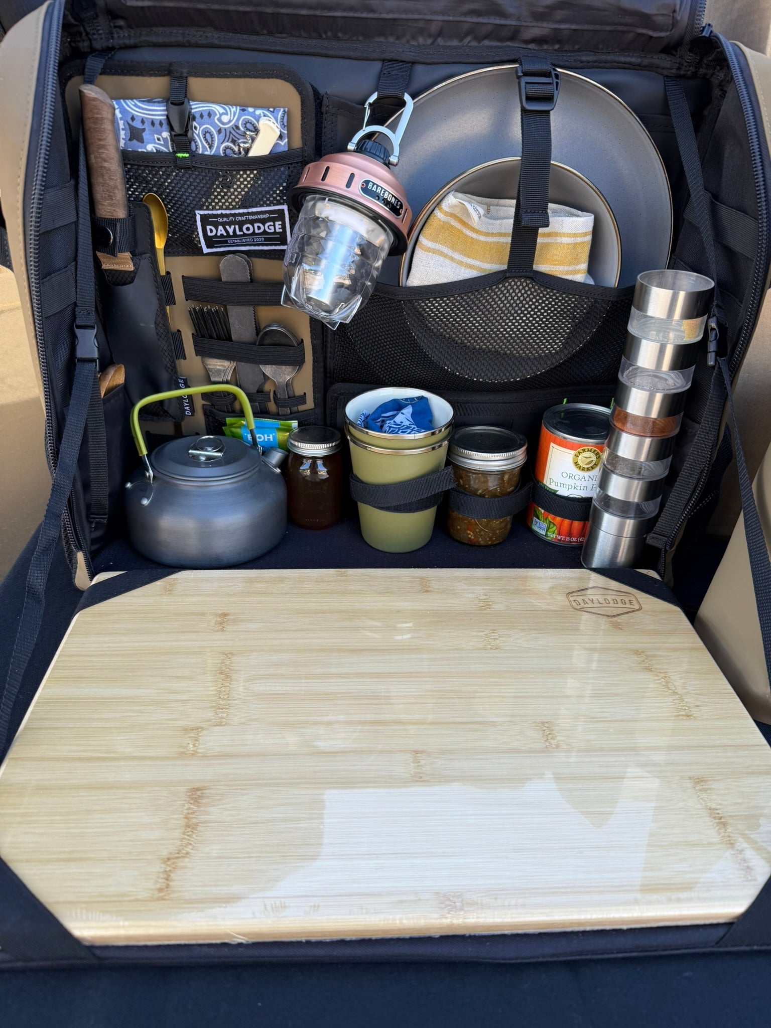 Another angle on the DAYLODGE Workspace Mobile Camp Kitchen, part of a vehicle based camp and travel setup