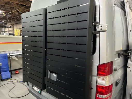 Another angle on the Avatar Offroad Sir Packs-a-lot Storage Mounting System, fitted to an overland van build