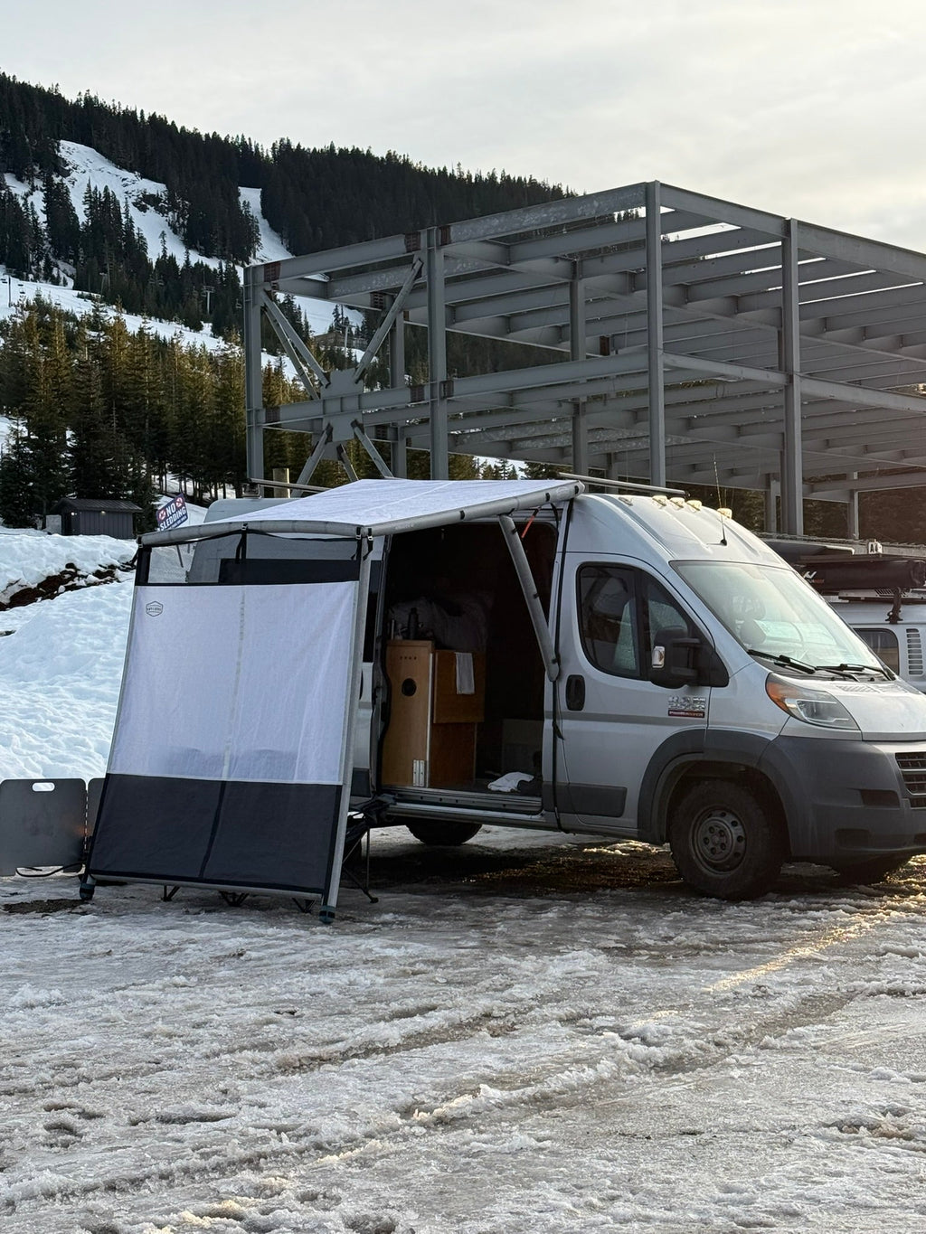 Further view of the DAYLODGE AirHaven 40 Annex Wall Kit, part of a vehicle based camp and travel setup