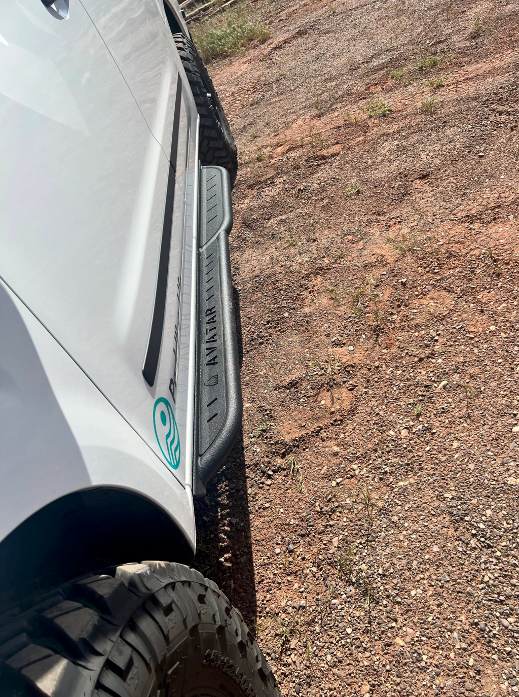 Further view of the Avatar Offroad Rockbody Side Steps for Nissan NV3500, fitted to an overland van build