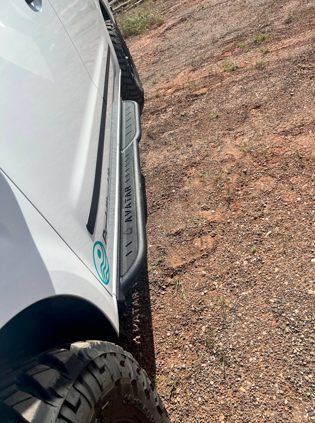 Further view of the Avatar Offroad Rockbody Side Steps for Nissan NV3500, fitted to an overland van build