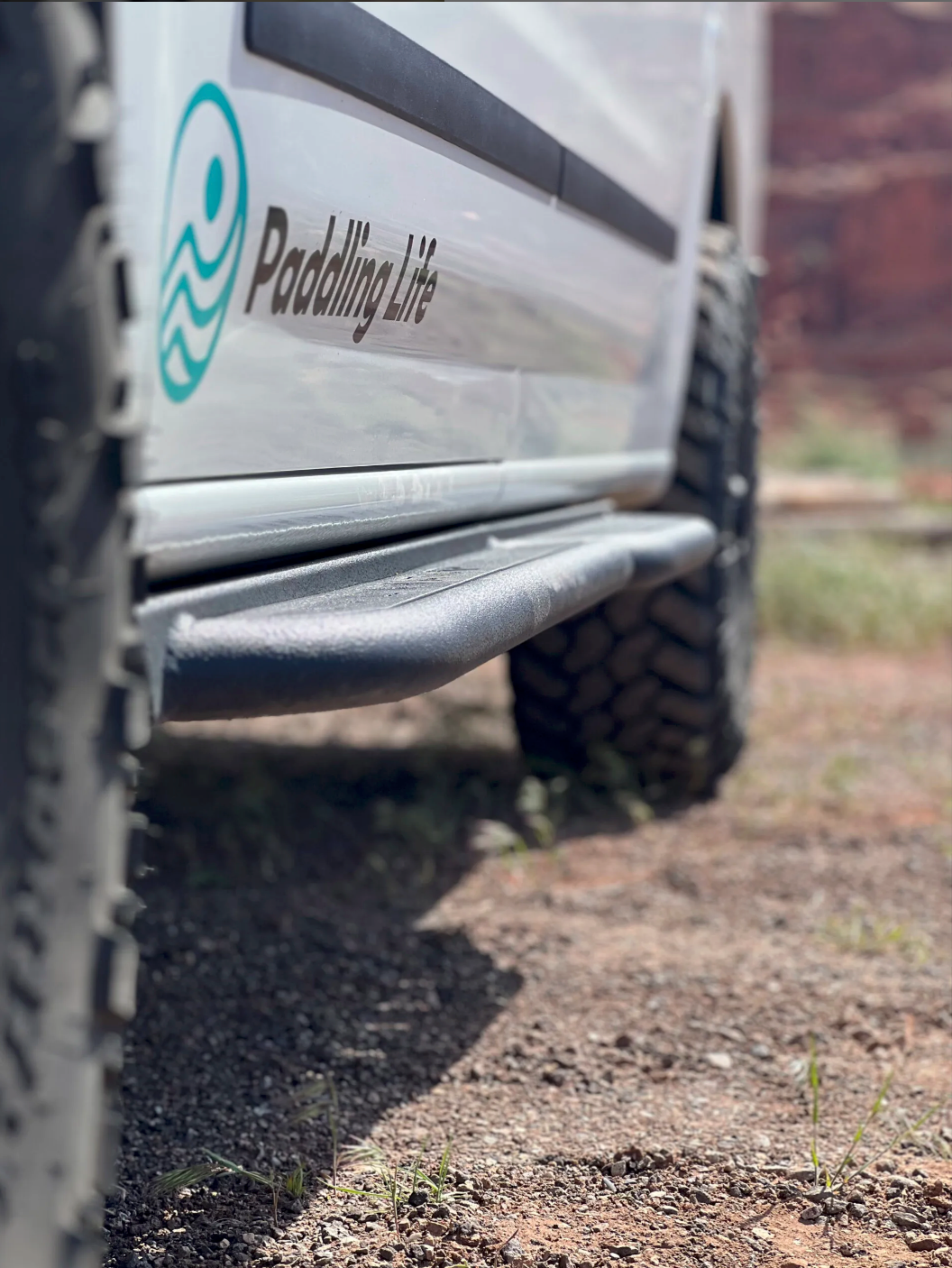 Another angle on the Avatar Offroad Rockbody Side Steps for Nissan NV3500, fitted to an overland van build