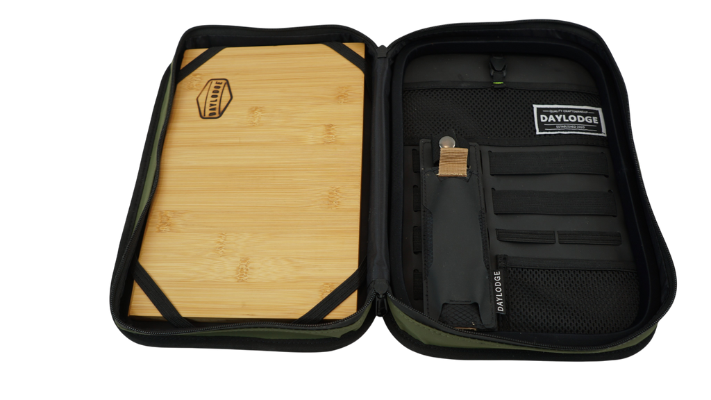 Wider view of the DAYLODGE Gaucho Kitchen Case, part of a vehicle based camp and travel setup