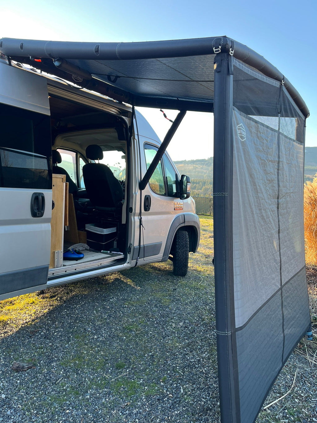 Product view of the DAYLODGE AirHaven 40 Vehicle Shelter System, part of a vehicle based camp and travel setup