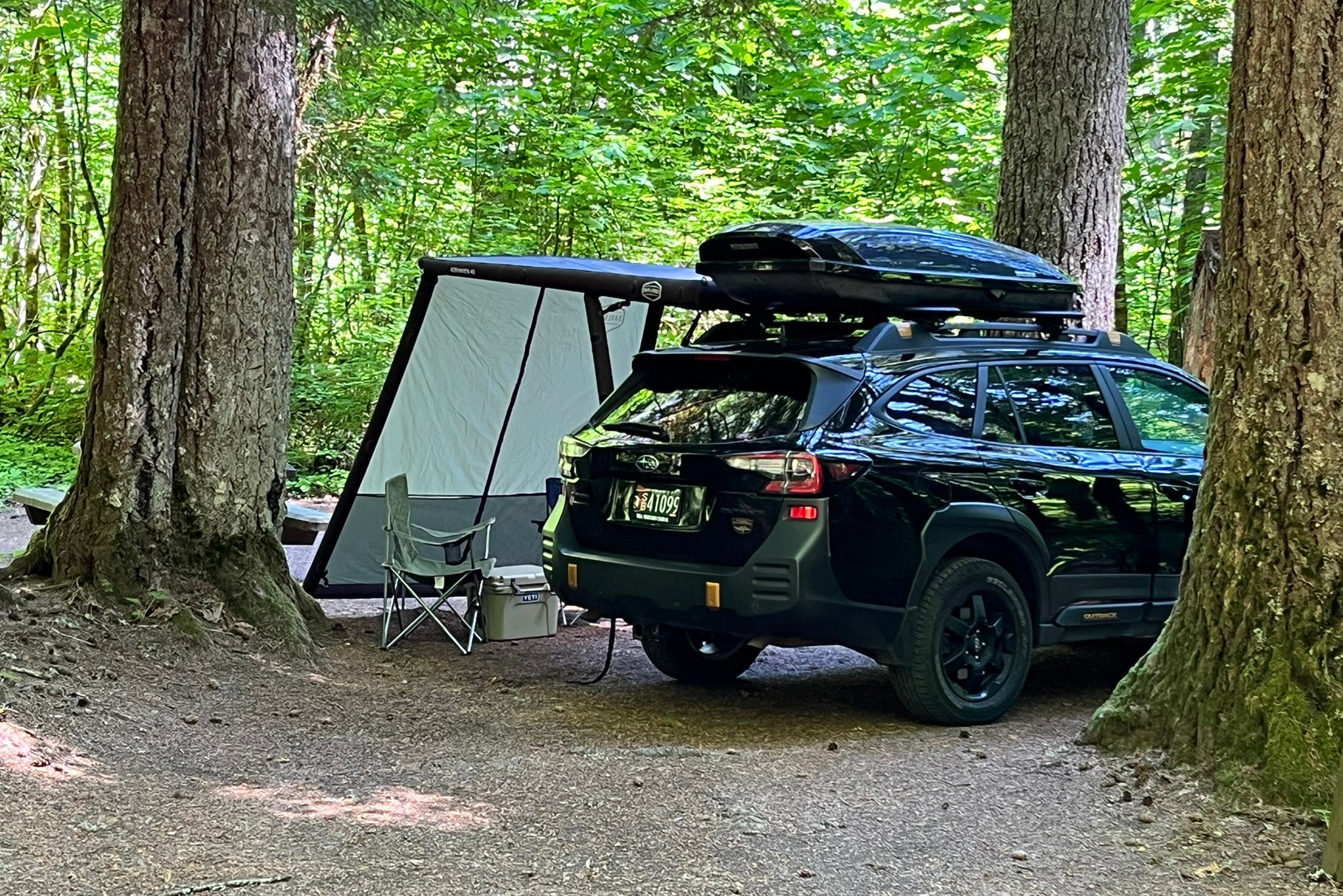 Context view of the DAYLODGE AirHaven 40 Annex Wall Kit, part of a vehicle based camp and travel setup