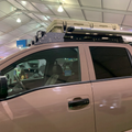 Avatar Offroad roof rack for the Nissan Titan, a low profile black platform rack for the truck cab
