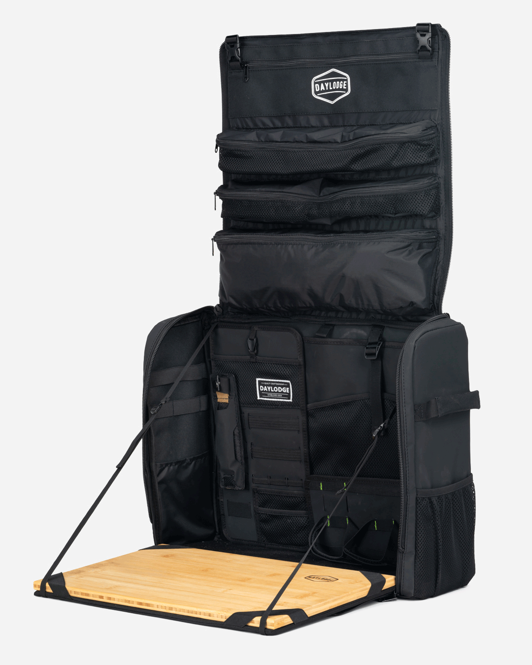 Animated view of the DAYLODGE Stash 64 Dry Goods Storage Bag, part of a vehicle based camp and travel setup