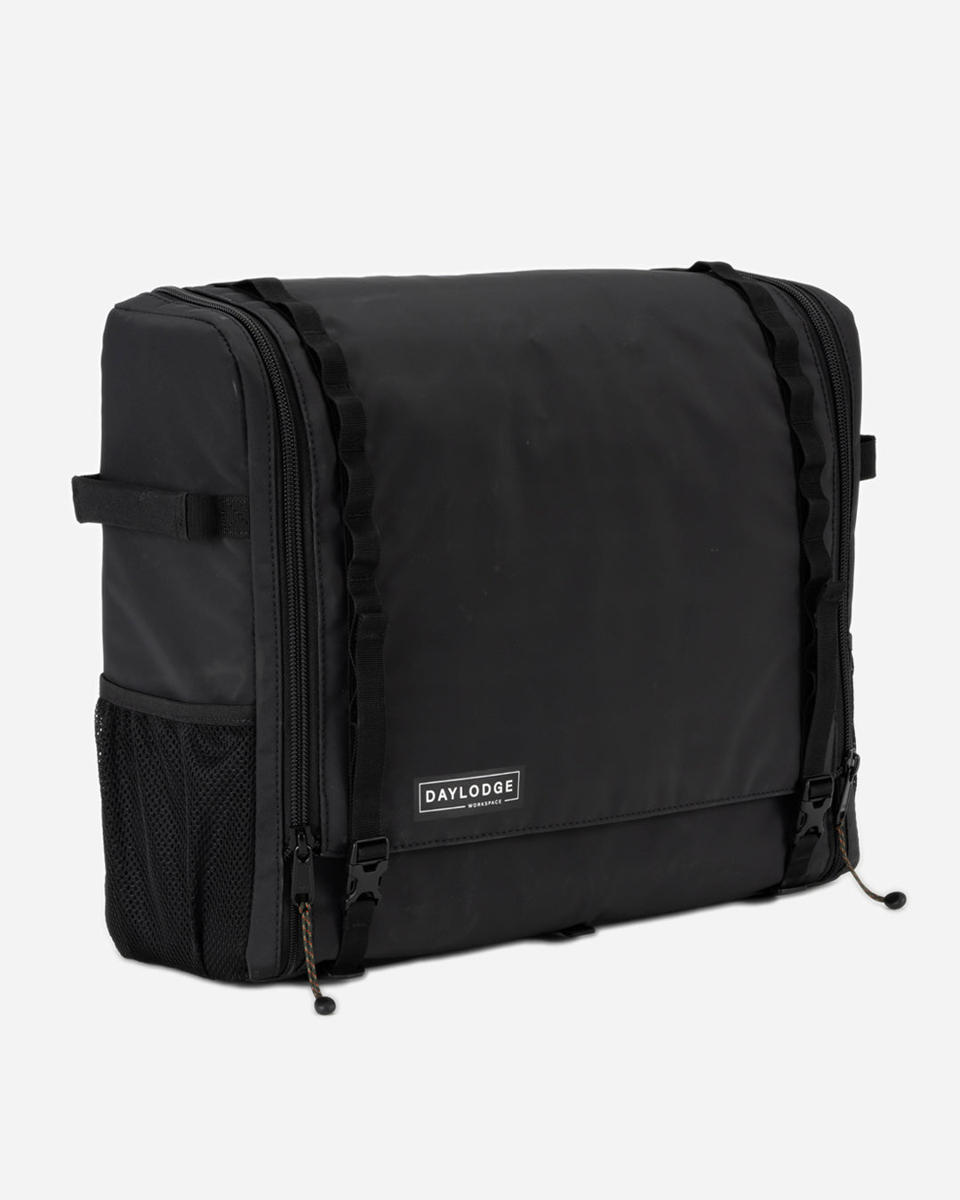 Closed view of the DAYLODGE Workspace Field Bag, part of a vehicle based camp and travel setup