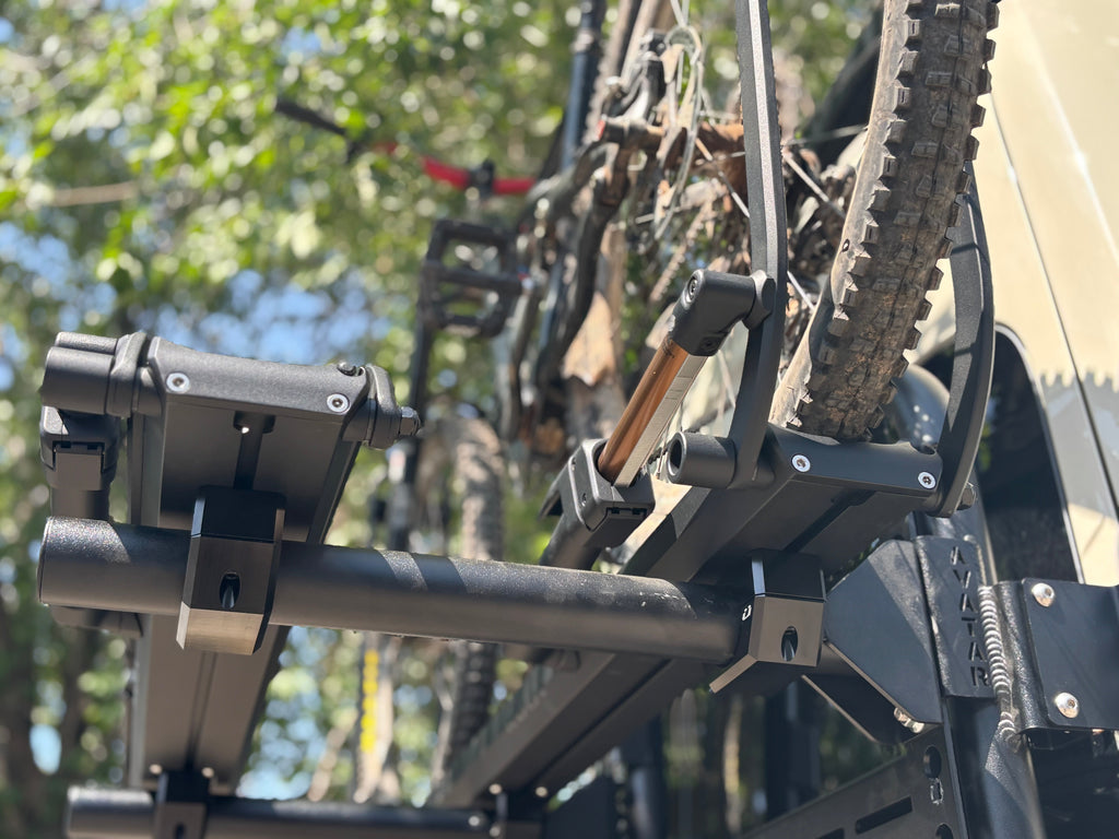 Angled view of the Avatar Offroad Bike Posts for the Massif System, part of the Avatar Offroad van storage and overland range