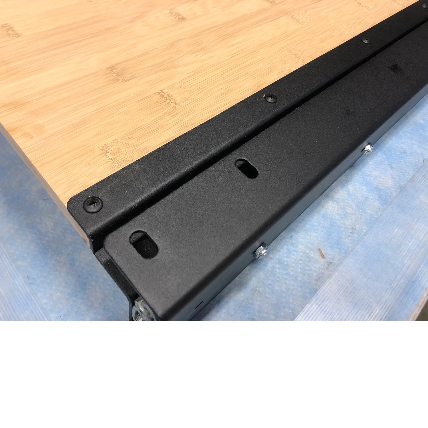 Underside view of the RB Components 20 Inch DIY Slide Tray Kit, a full extension slide tray with a timber deck for van cargo