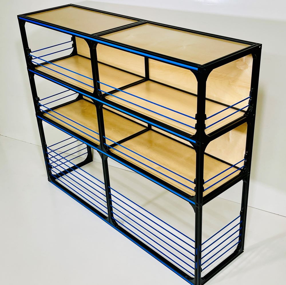 Another angle on the TNTvans Wheel Well Shelving Kit for Camper Vans, part of a DIY camper van conversion interior