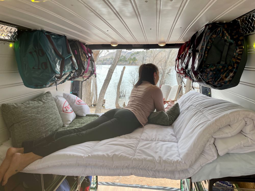Close up of the TNTvans 48 Inch Van Bed and Shelving Kit, part of a DIY camper van conversion interior