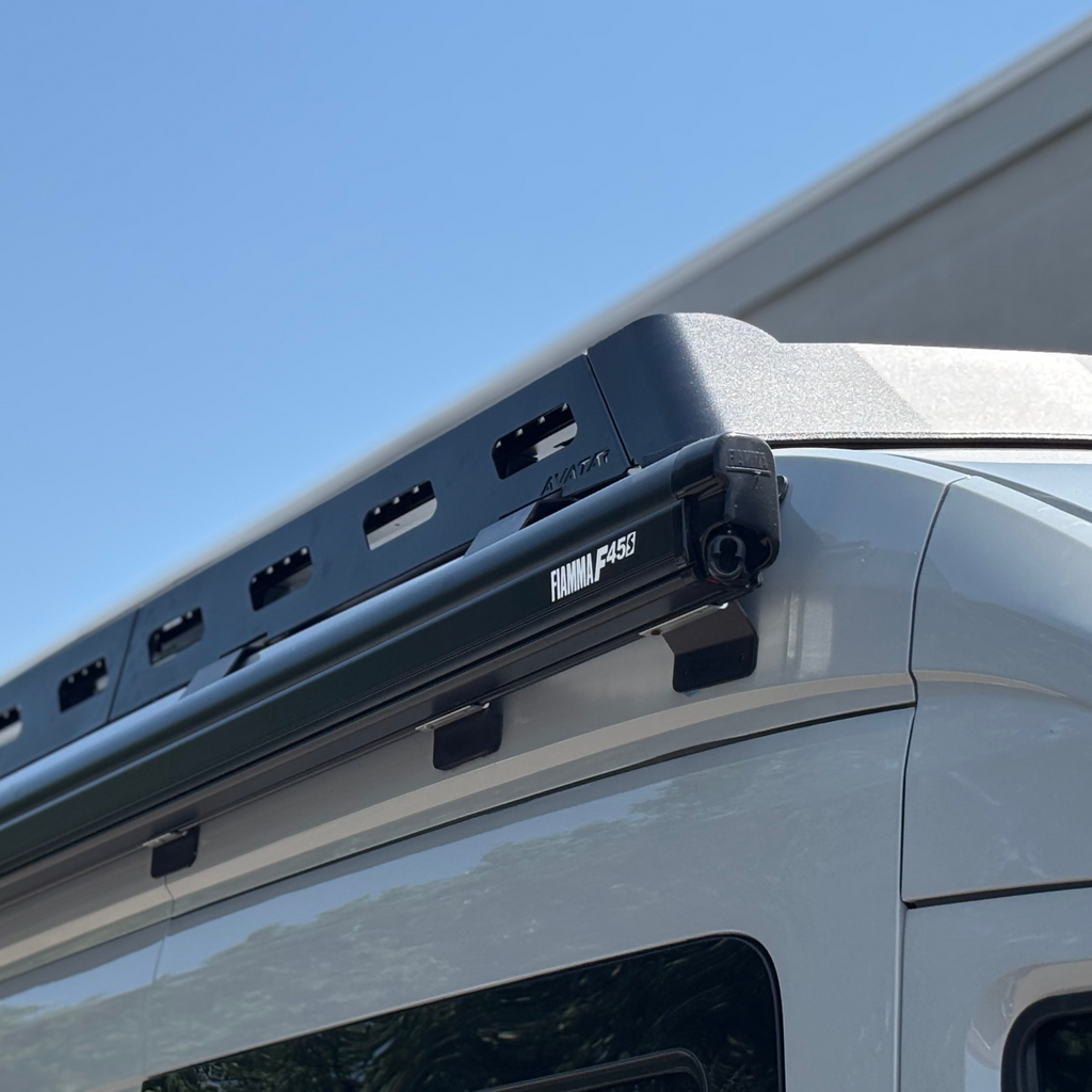 Wider view of the Avatar Offroad Pioneer Roof Rack for Ford Transit, fitted to an overland van build