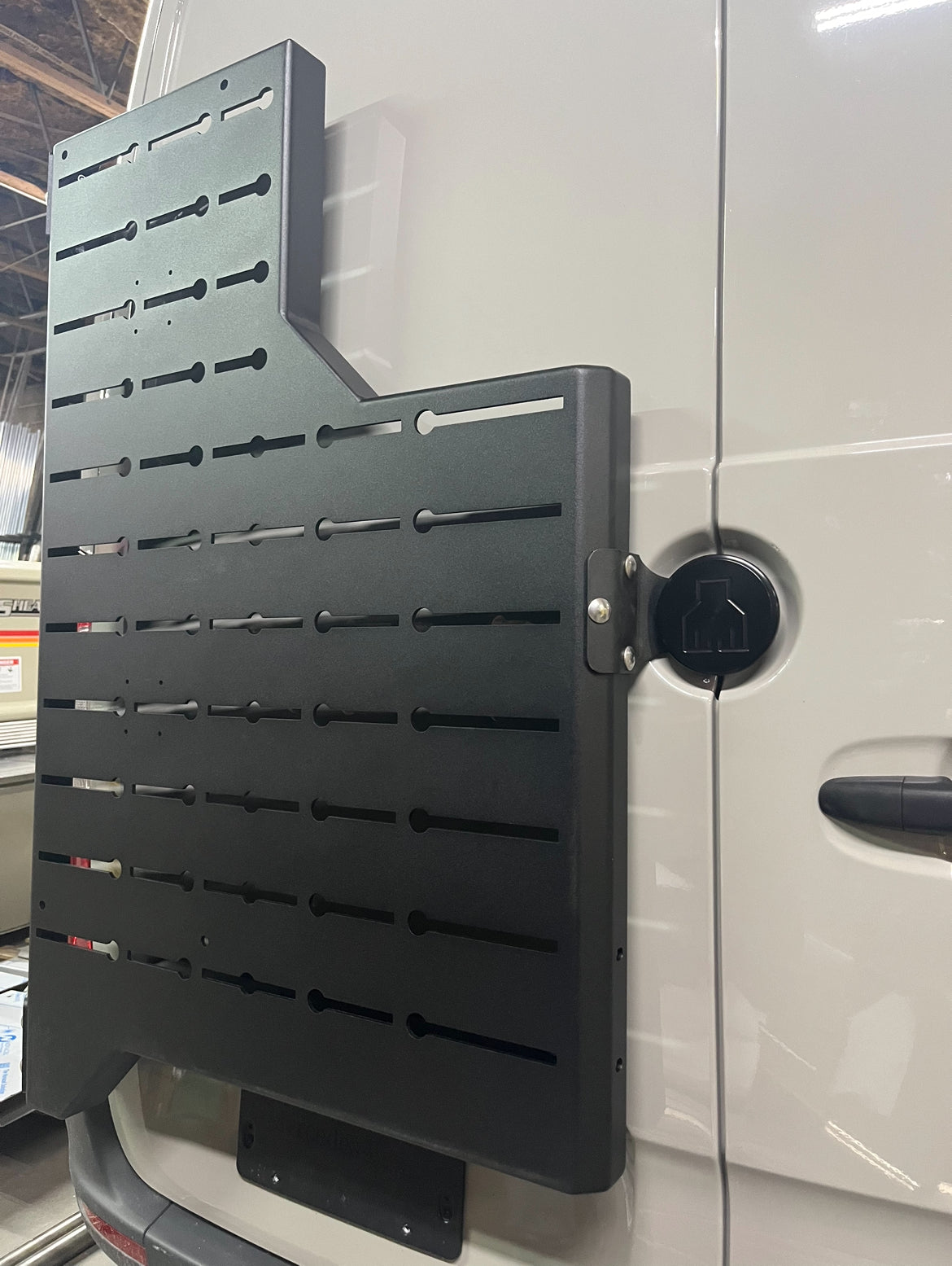 Alternate view of the Avatar Offroad Outpost Sprinter Mounting Carrier, fitted to an overland van build