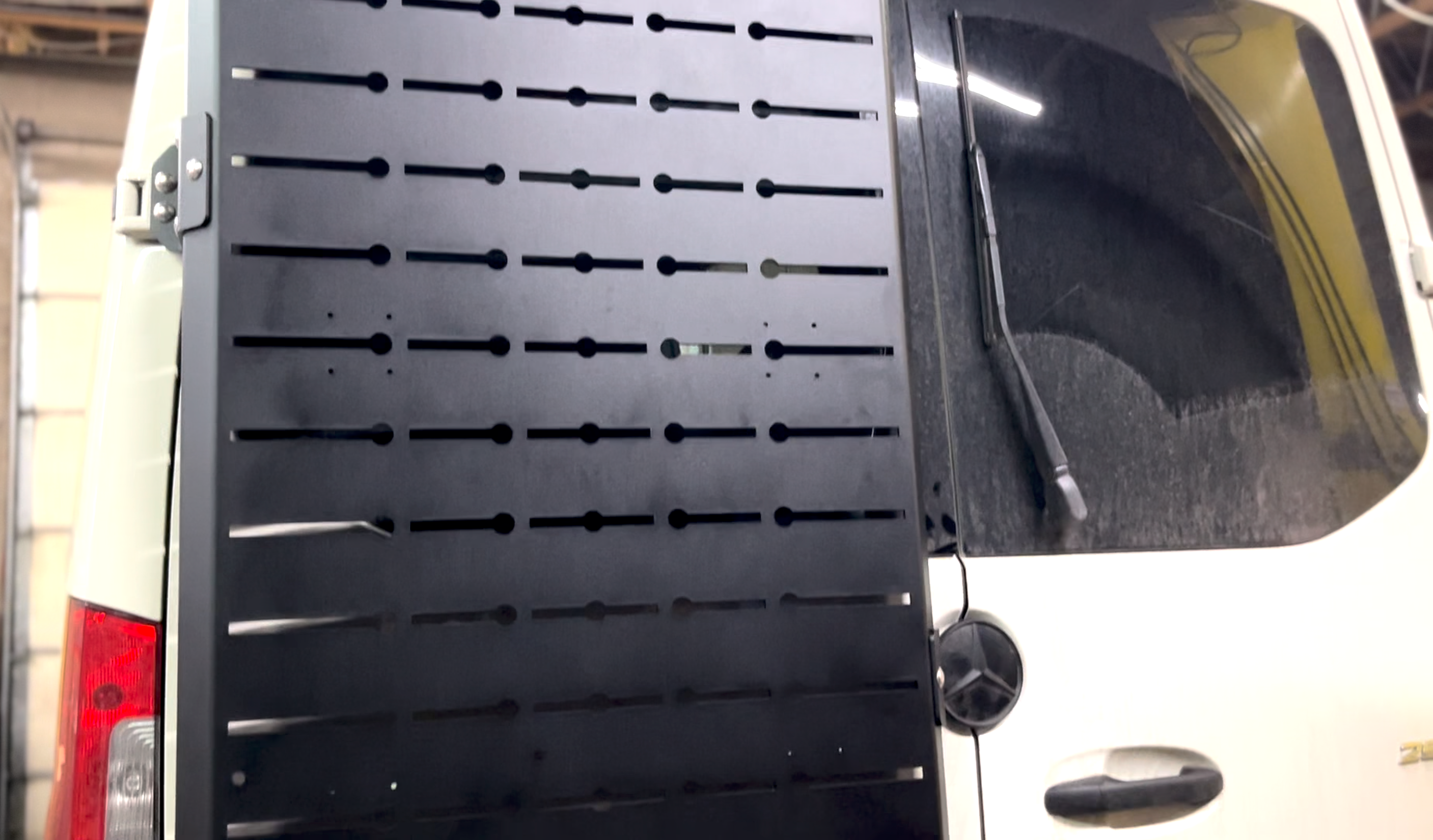 Further view of the Avatar Offroad Sir Packs-a-lot Storage Mounting System, fitted to an overland van build