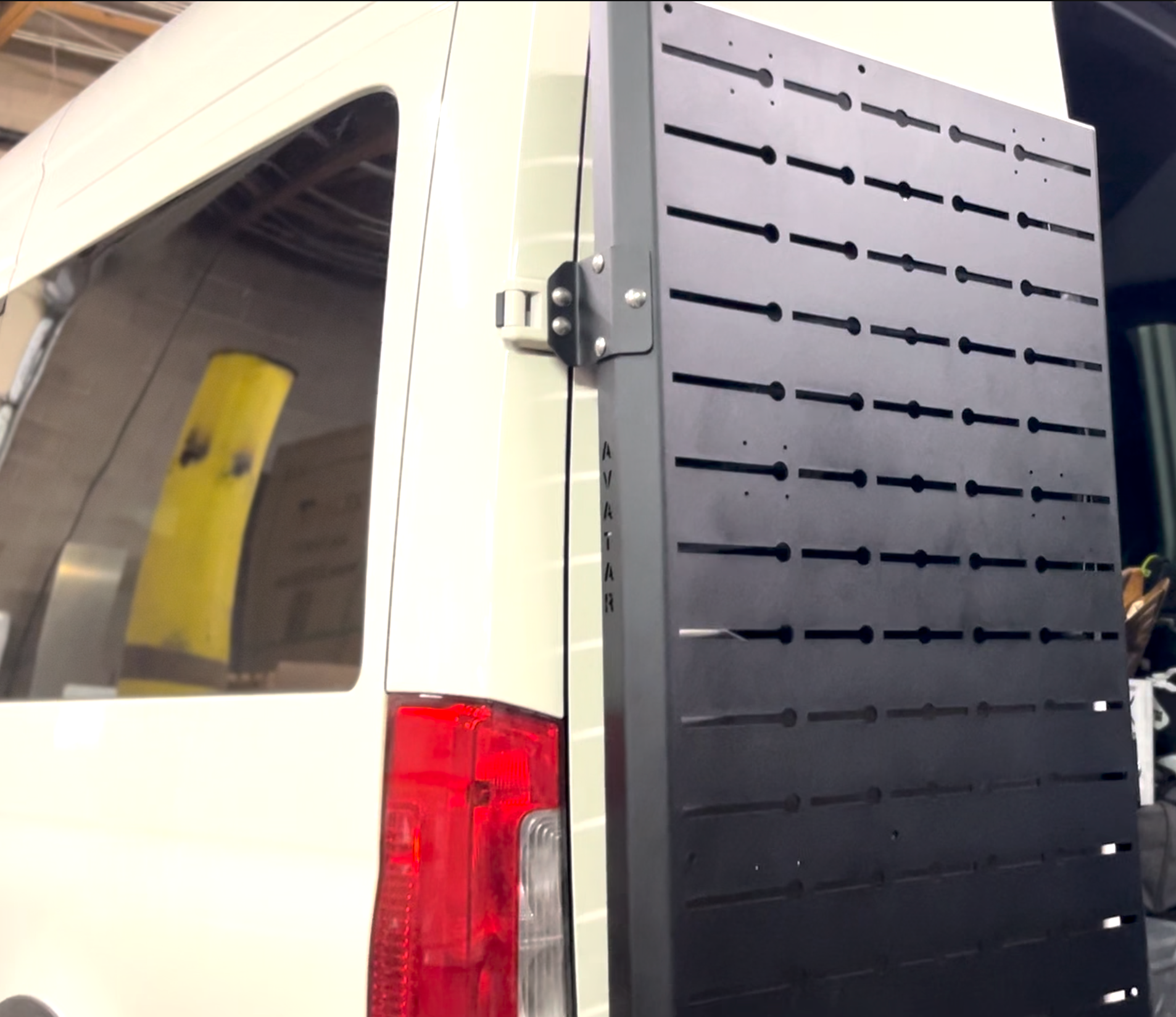 Avatar Offroad Sir Packs-a-lot storage mounting system fitted to the rear doors of a Mercedes Sprinter