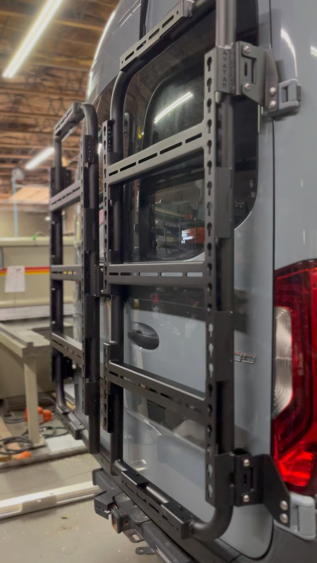 Rear view of the Avatar Offroad Massif Van Rear Door Storage System, fitted to an overland van build