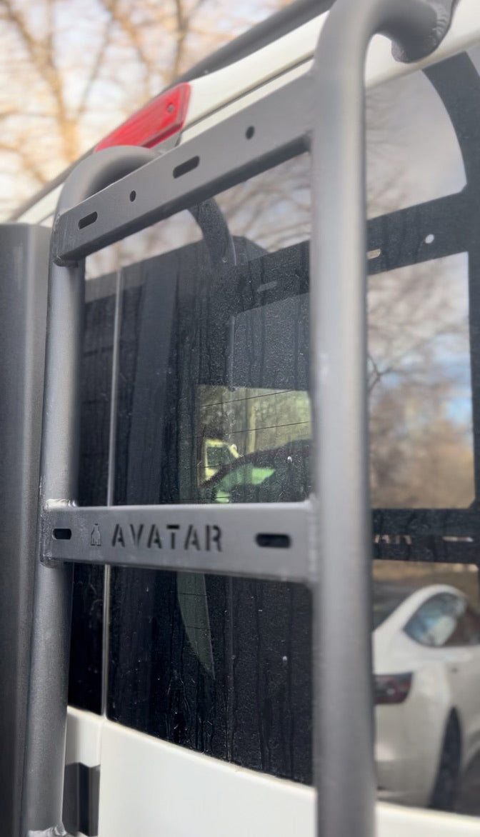 Wider view of the Avatar Offroad Rear Ladder for Nissan NV3500, part of the Avatar Offroad van storage and overland range