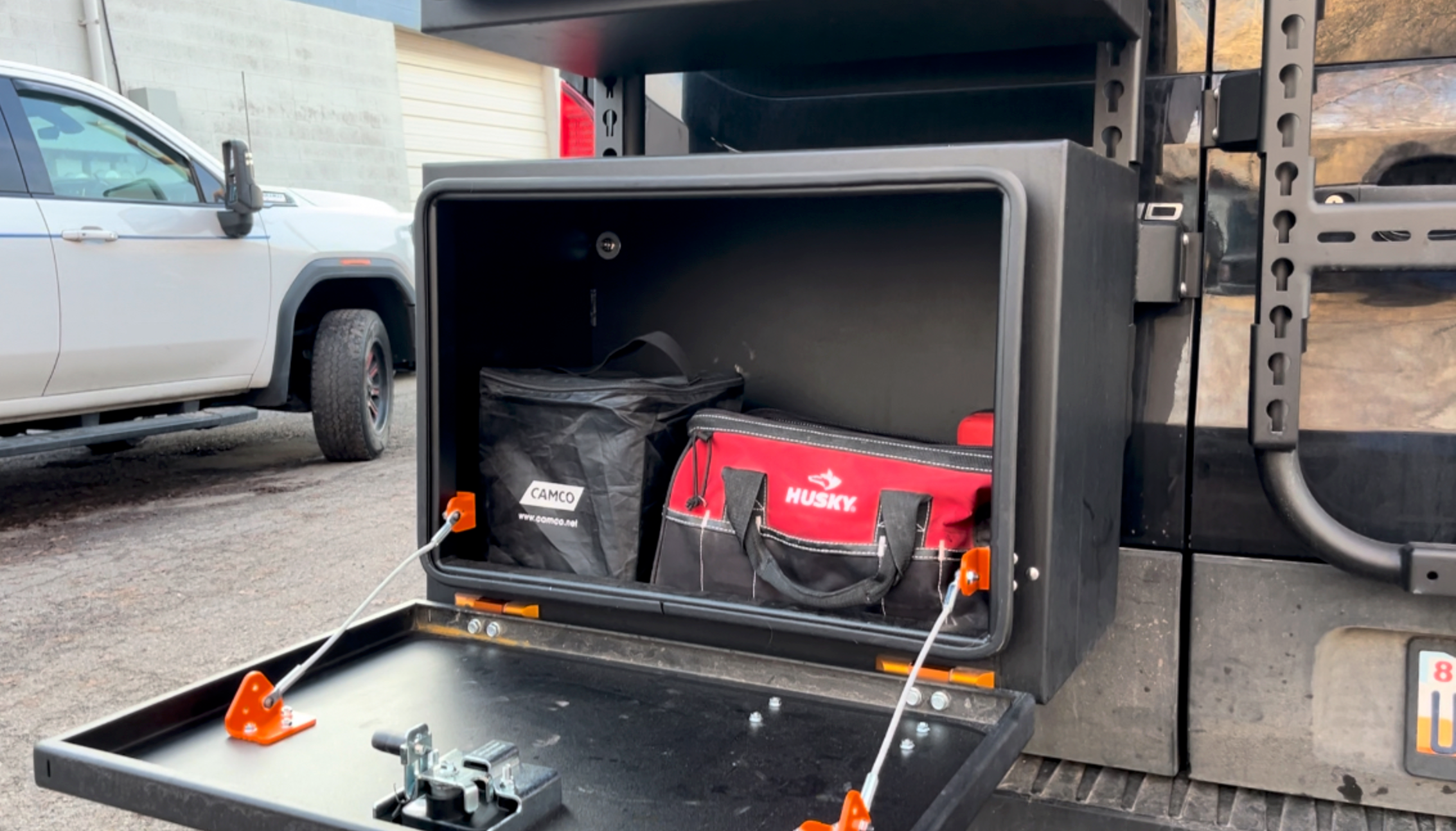 Another angle on the Avatar Offroad Deka Small Rear Door Storage Box, fitted to an overland van build