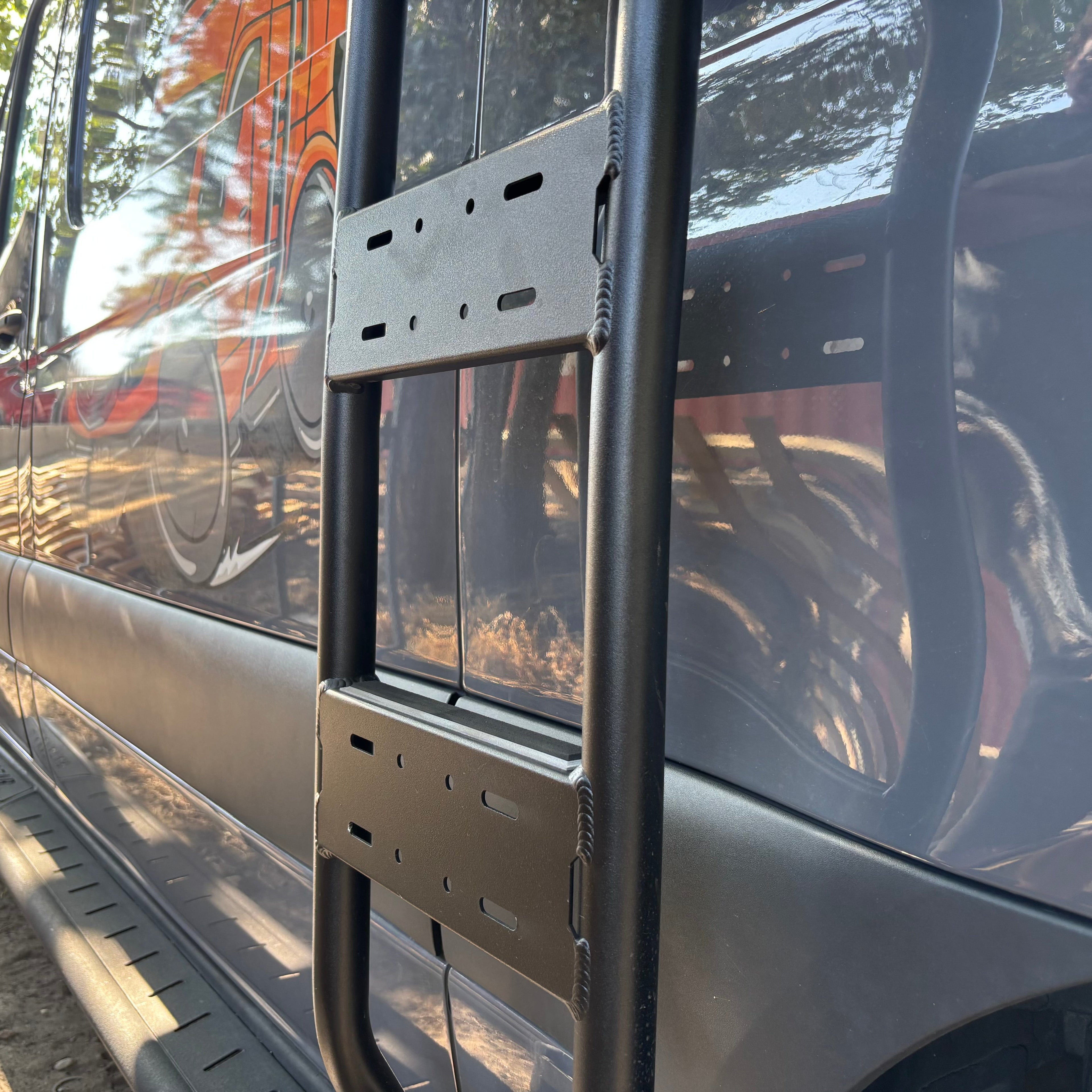 Close up of the Avatar Offroad Side Ladder for Mercedes Sprinter, part of the Avatar Offroad van storage and overland range