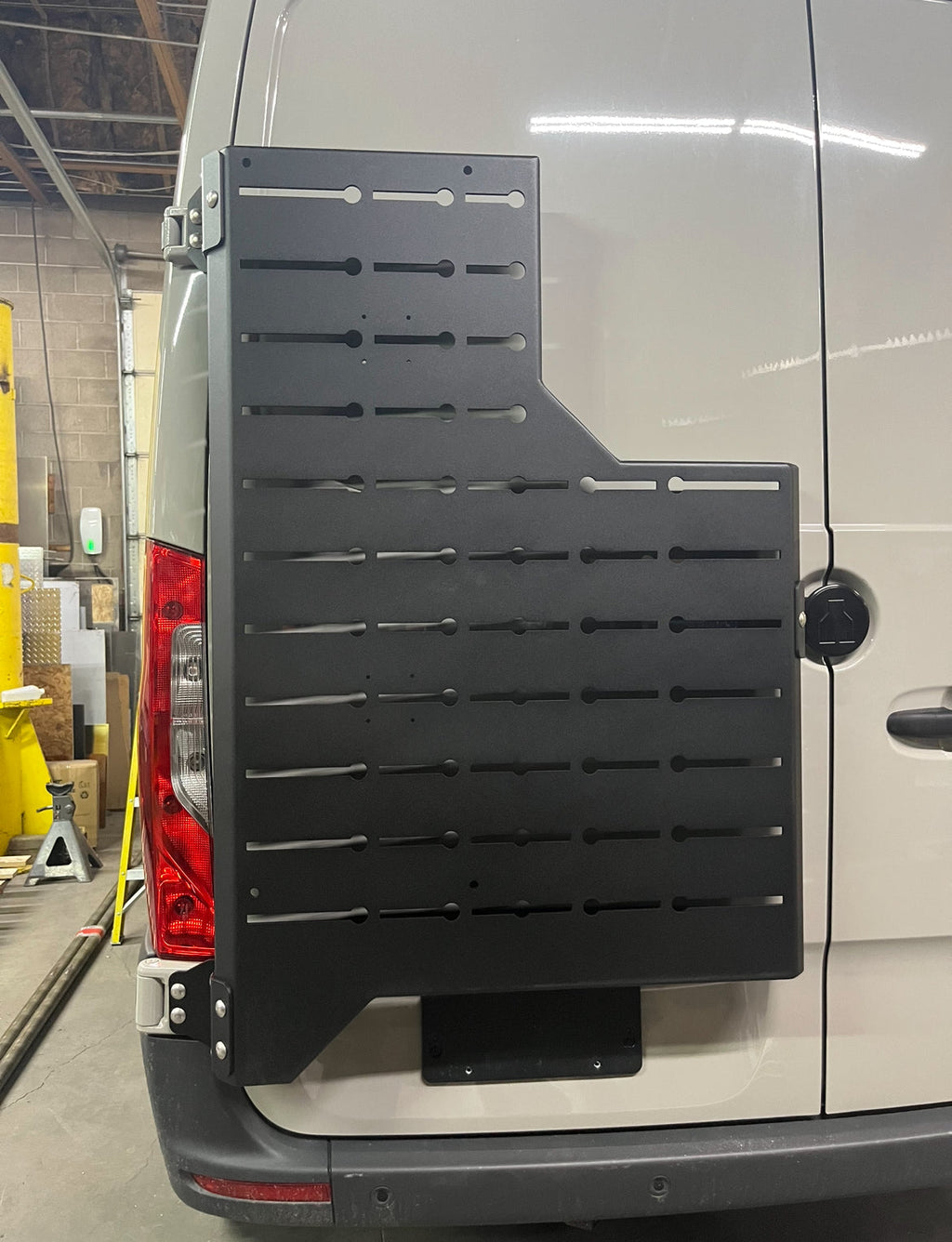 Close up of the Avatar Offroad Outpost Sprinter Mounting Carrier, part of the Avatar Offroad van storage and overland range