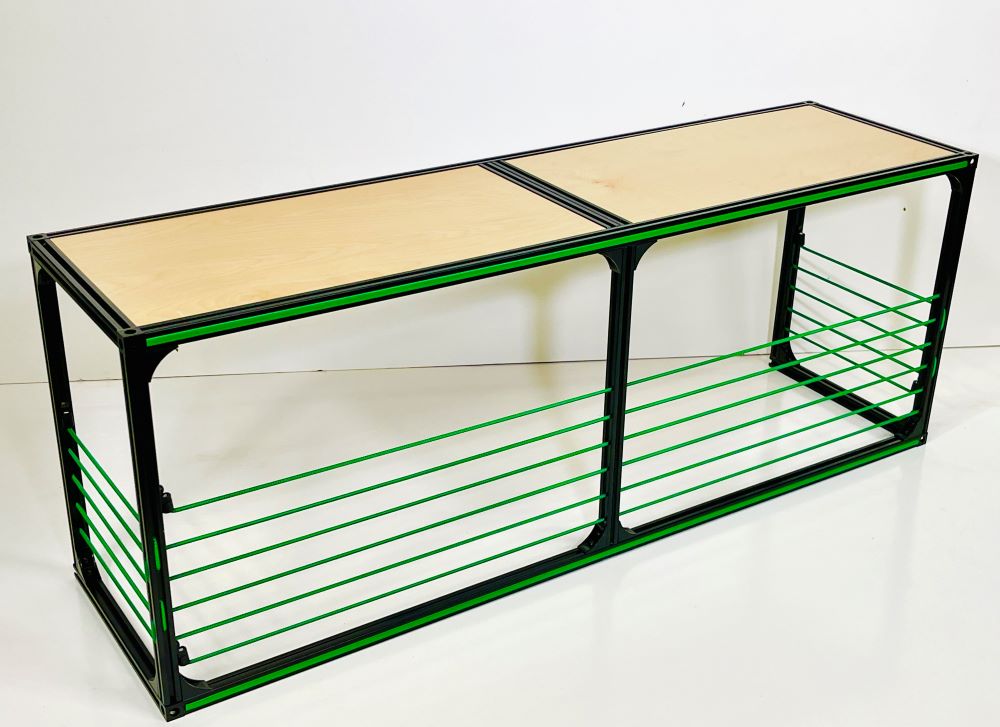 TNTvans wheel well bench with storage fitted over the wheel arch inside a camper van conversion