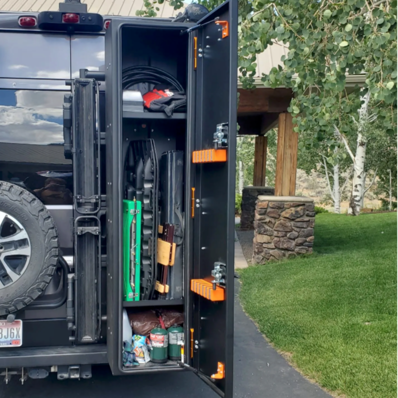 Angled view of the Avatar Offroad Ski 4 Rear Door Ski and Snowboard Box, fitted to an overland van build