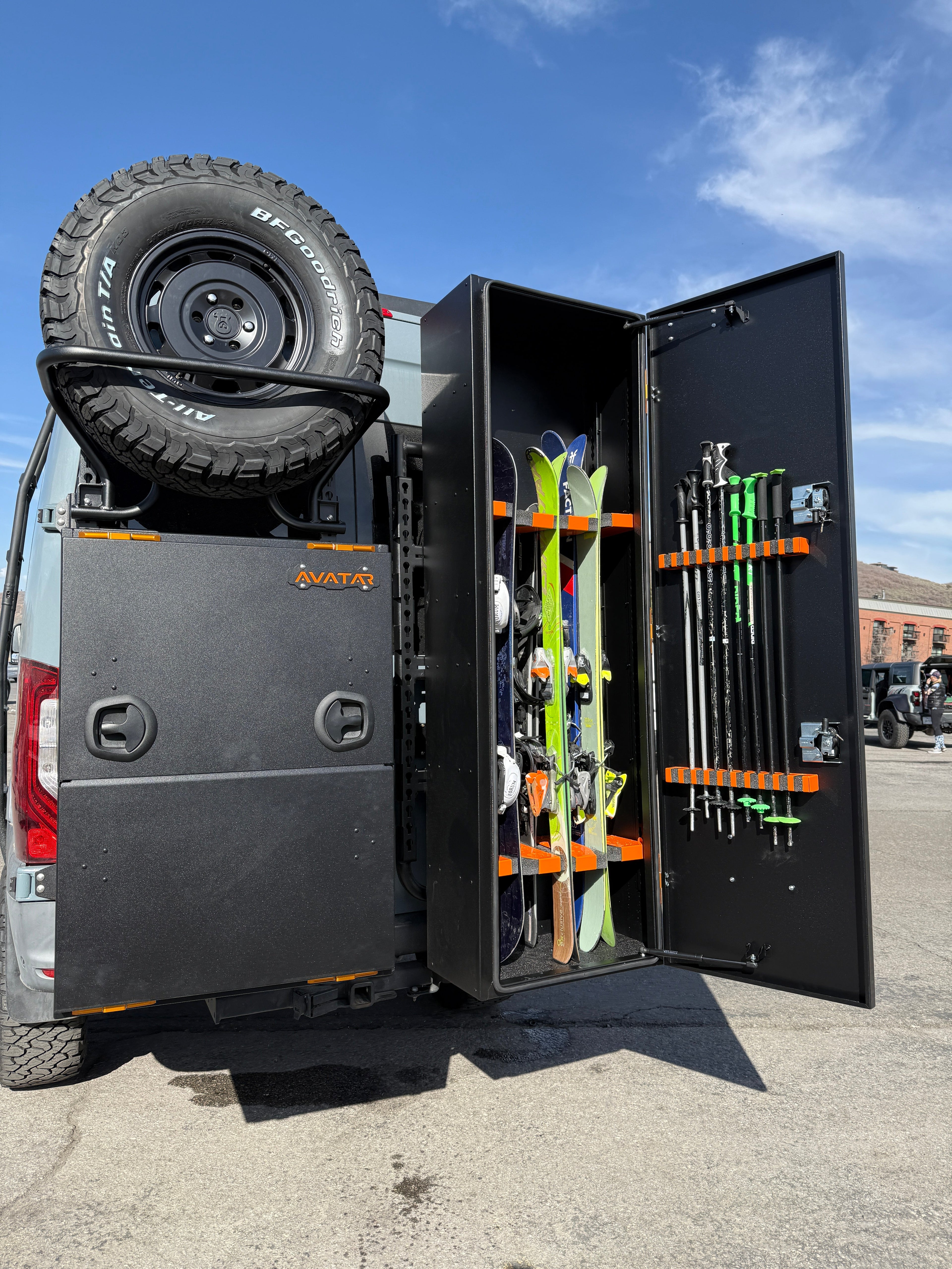 Alternate view of the Avatar Offroad Spare Tire Carrier for the Massif System, fitted to an overland van build