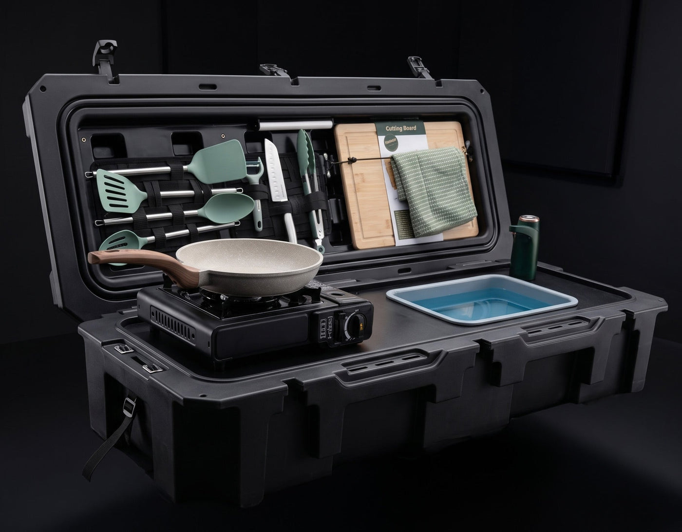 VOZ Camp Kitchen portable cook station shown as a closed black case ready for camp cooking