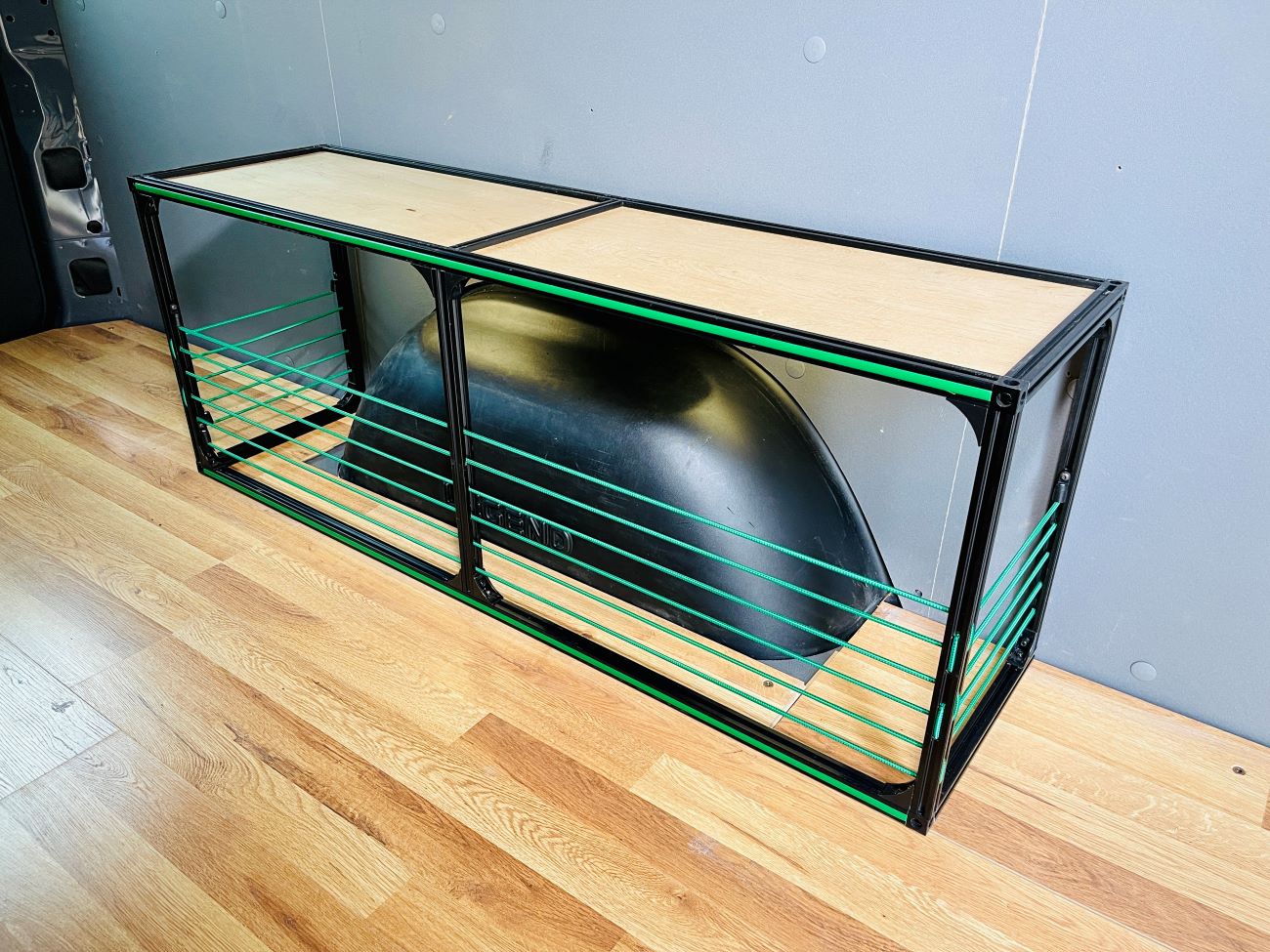 Further view of the TNTvans Wheel Well Bench with Storage for Camper Vans, part of a DIY camper van conversion interior
